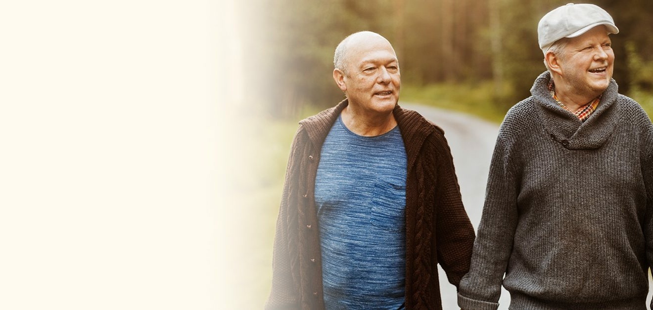 Two Men walking and holding hands